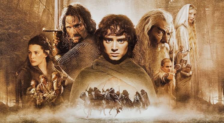 sociedade do anel 2001 onde assistir frodo bolseiro carregando anel dourado com sociedade dos nove companheiros caminhando pelas montanhas nevoa
