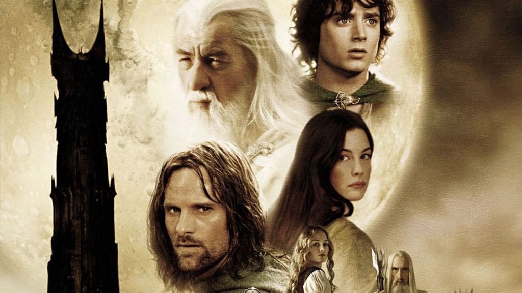duas torres 2002 onde assistir gandalf o branco a cavalo chegando no abismo de helm ao amanhecer com exercito de rohan e frodo com sam e gollum no pantano